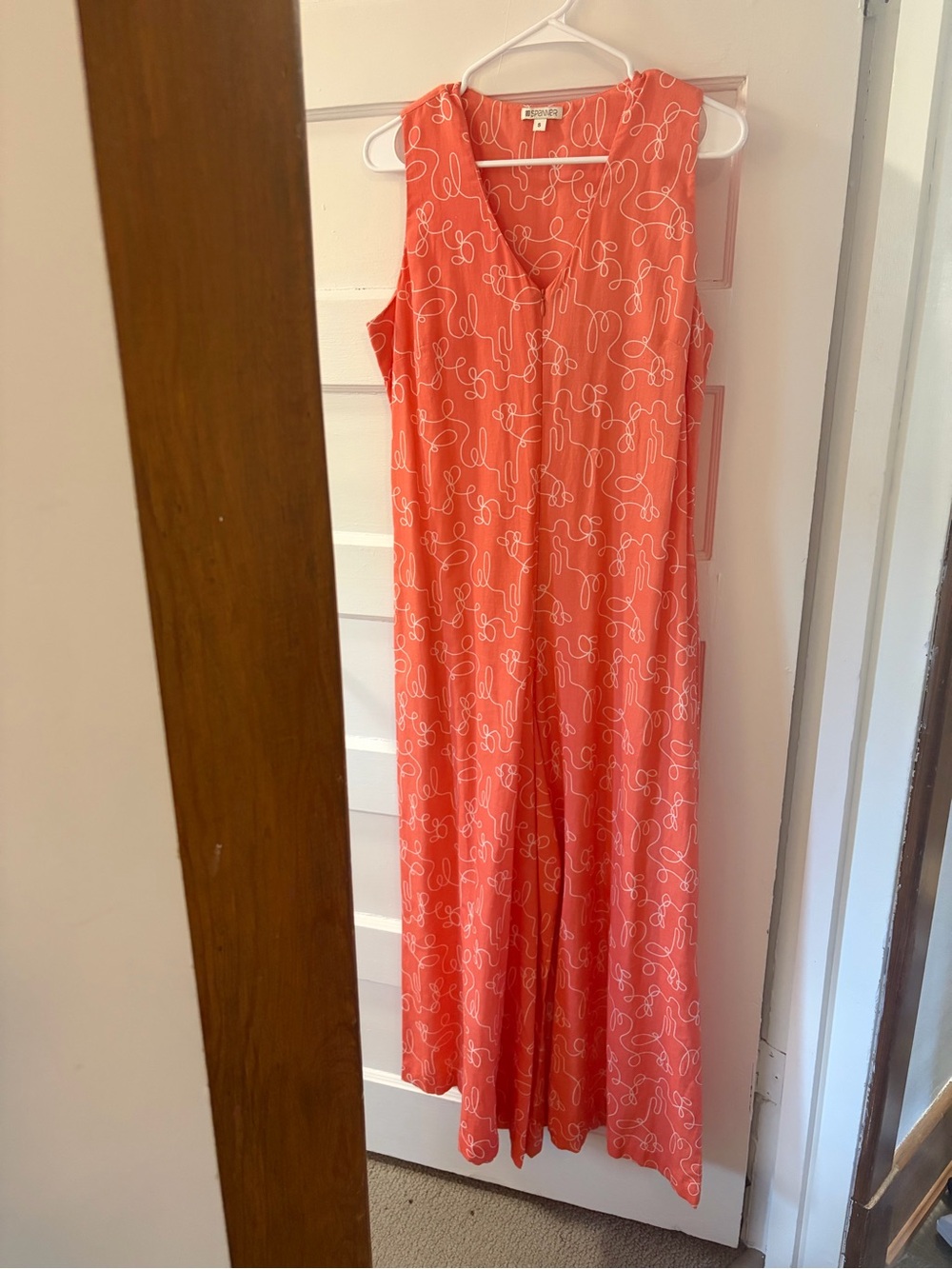 SPANNER Coral Sleeveless V-Neck Printed Jumpsuit with pockets